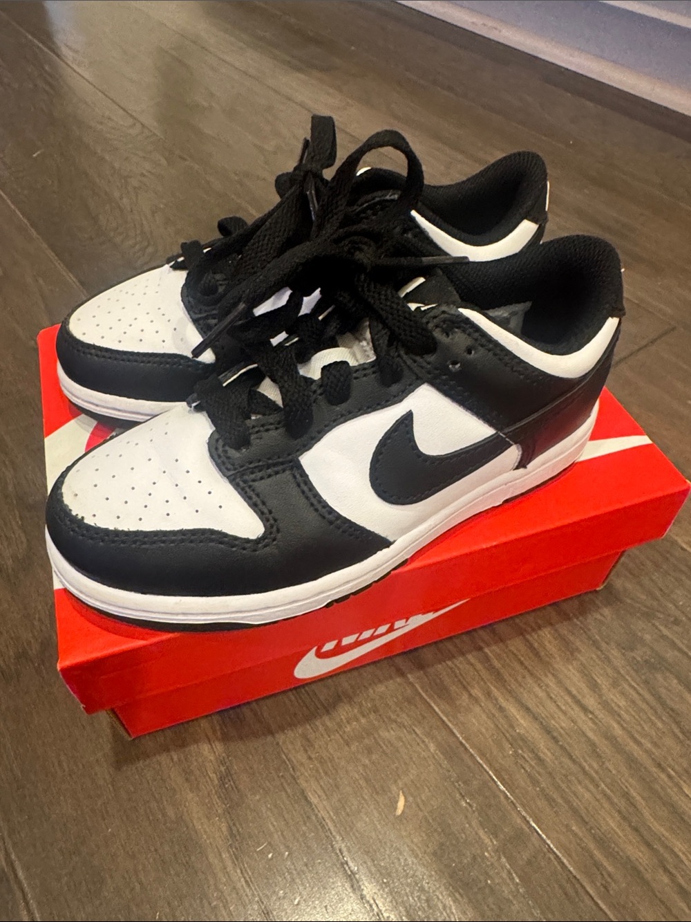 Nike Kids Black and White Low-Top Sneakers with Swoosh